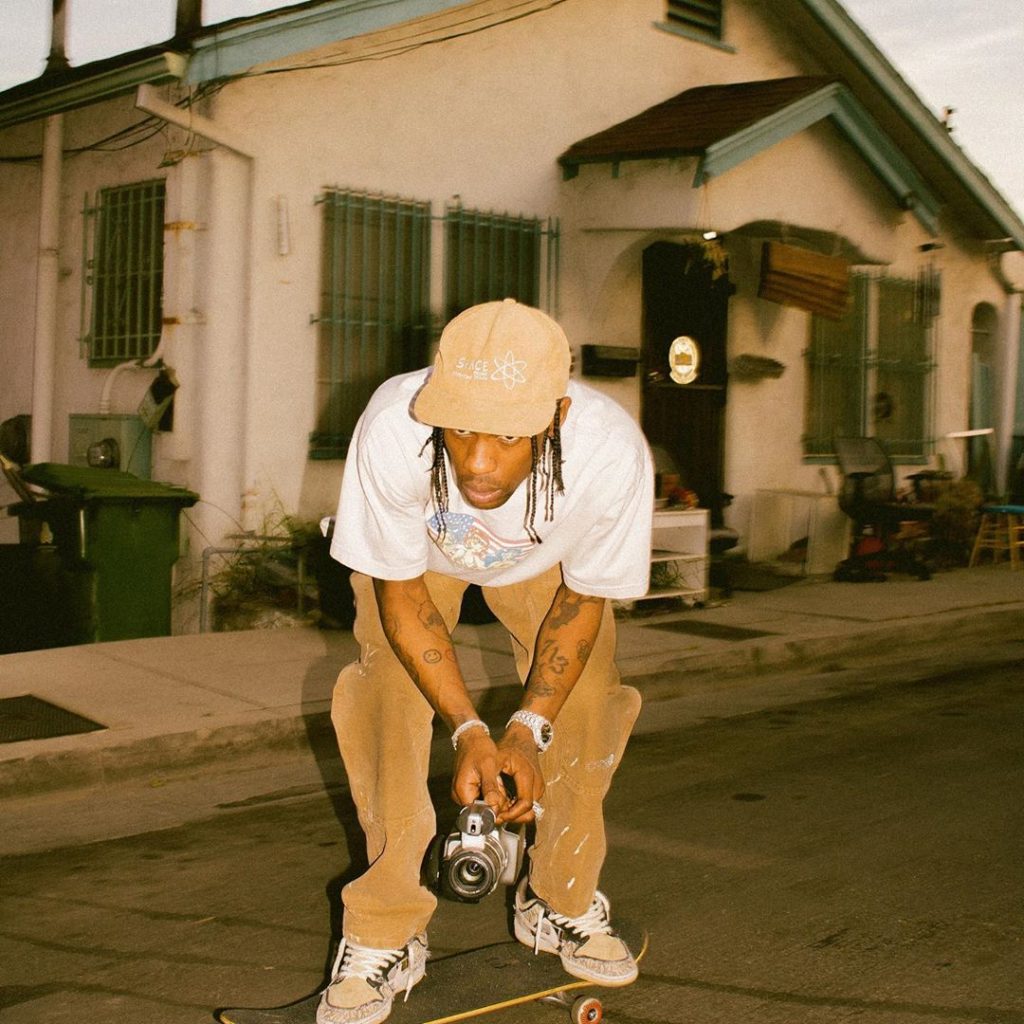 Travis Scott on skateboard wearing the Nike SB Dunk Low at Los Angeles